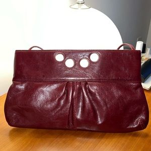 Latino Burgundy Leather Clutch with strap and interior pockets